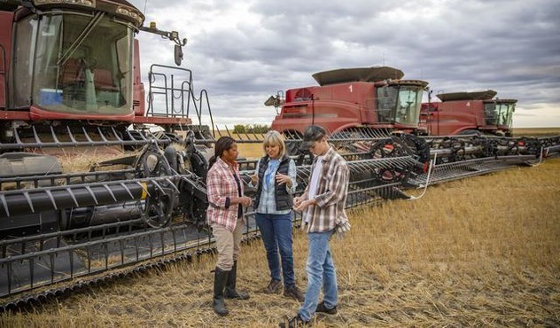 Farmers with Combines