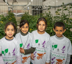 kids in greenhouse
